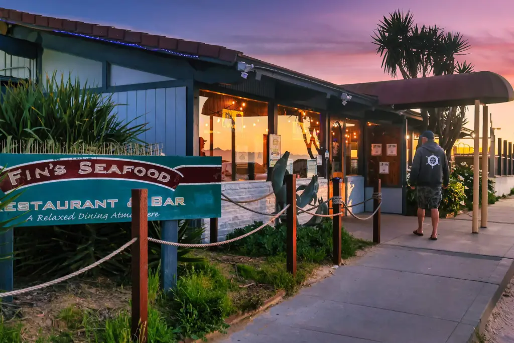 Sign and entry to Finn's Seafood Restaurant and Bar in Grover Beach, CA